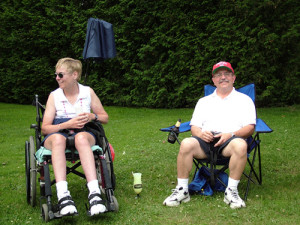 jc1230 montpelier vt vermont handicapped woman couple sitting fourth july picnic